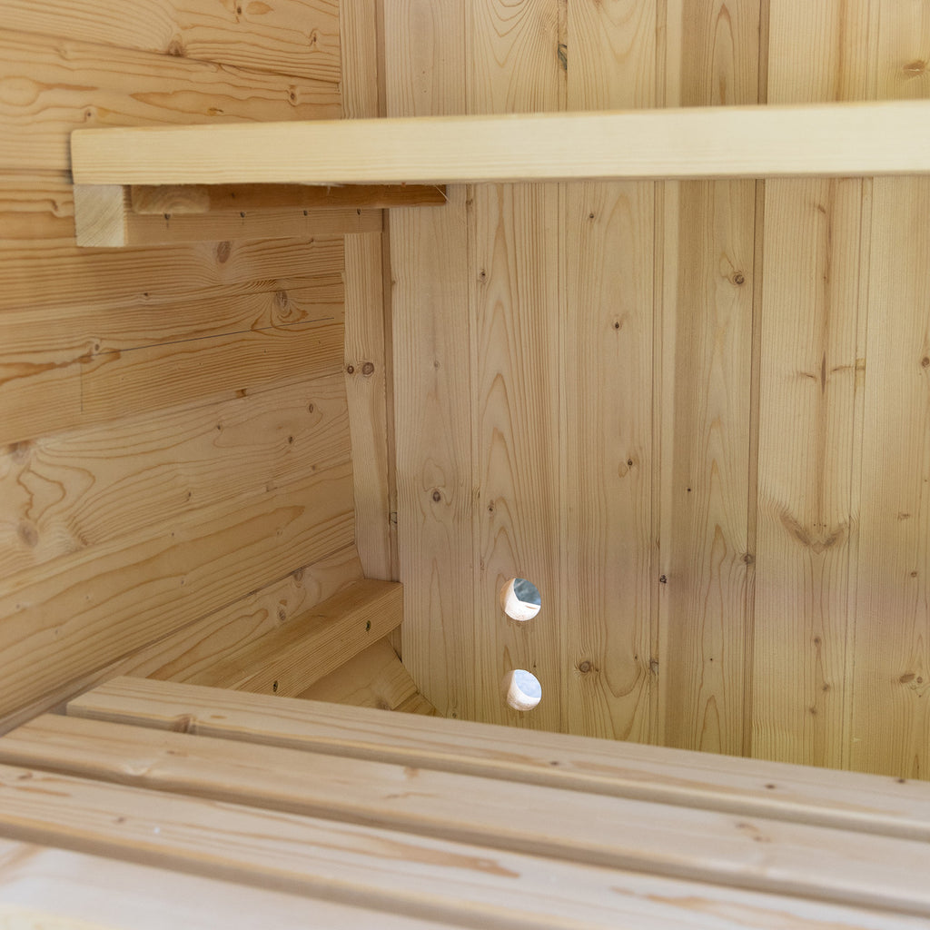 Auris One cedar barrel sauna installed on backyard deck