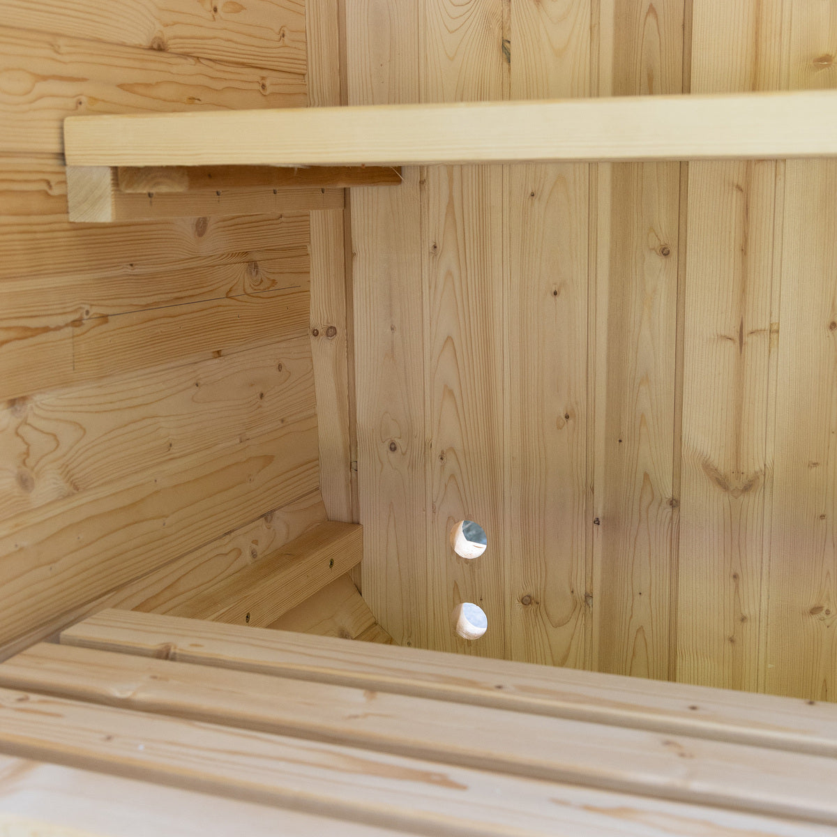 Auris One cedar barrel sauna installed on backyard deck