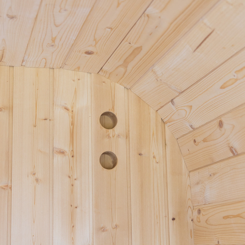 Auris One luxury outdoor sauna, evening lifestyle setting